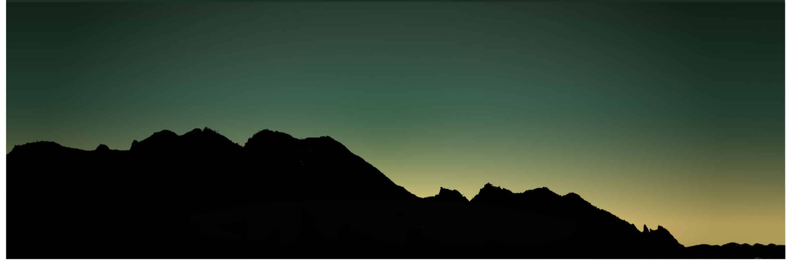 background of the hero section - a representation of the flatiron mountains west of boulder Colorado